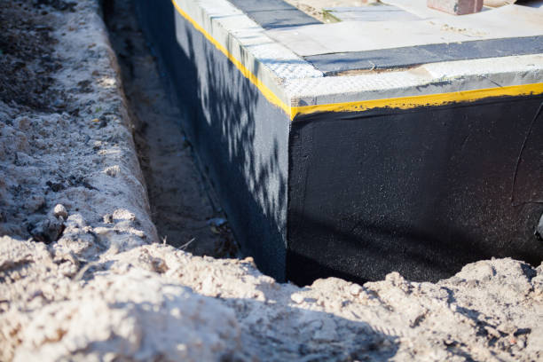 Professional Waterproofing technician working in Danville, PA